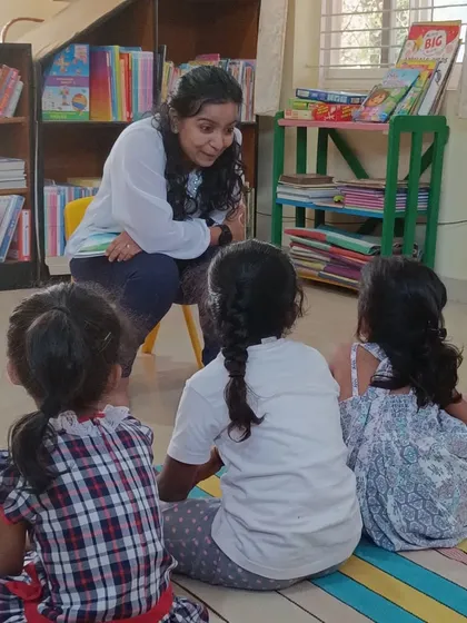 A close up interaction between the storyteller and the children, creating a personal connection.