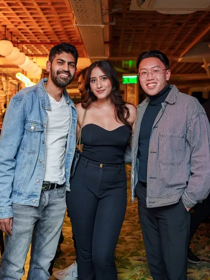 A group of friends enjoying the VIBE CHECK experience.