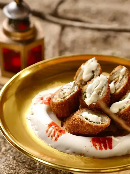 A closer look at the Chicken & Cheese Swiss Rolls, sliced to show the delicious filling. This is one of my most requested fusion appetizers.