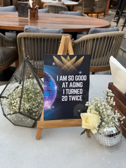 "I am so good at aging I turned 20 twice." These fun table cards are great conversation starters for a milestone birthday.