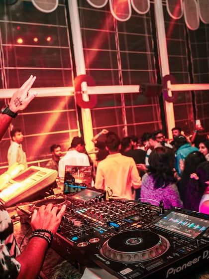 Interacting with a lively crowd from the DJ booth. Seeing people this engaged and happy is the ultimate reward and my main motivation for every gig.