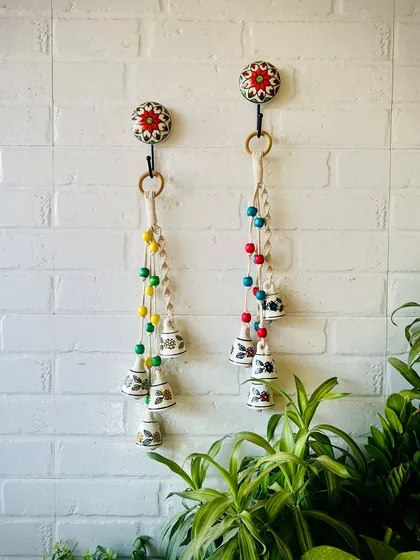 Meet our Symphony Chimes, a bestseller that has found a place in over 1100 homes and counting. Each chime is a little piece of music for your home, handcrafted with hand-painted ceramic bells, colorful wooden beads, and intricate macrame knots. They are perfect for adding a serene touch to your entrance or as a thoughtful Diwali gift.