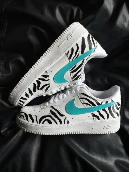 A top-down view of the zebra stripe custom sneakers.