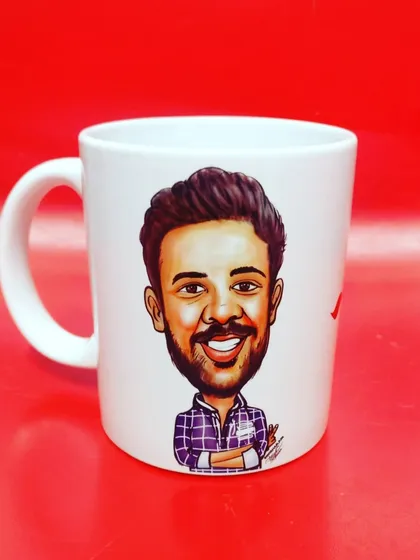 This is my most popular item, a custom caricature mug. I take a photo you provide and draw a detailed, full-color caricature that captures the person's likeness in a fun way. The artwork is printed on a classic white ceramic mug, making it a perfect gift for birthdays or any special occasion.