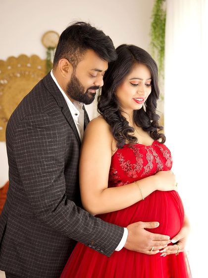 A close-up of the couple in our boho studio. The husband's gentle embrace and their serene expressions create a beautiful and loving portrait.
