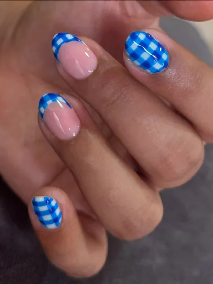 A different angle of the cute blue gingham French manicure.