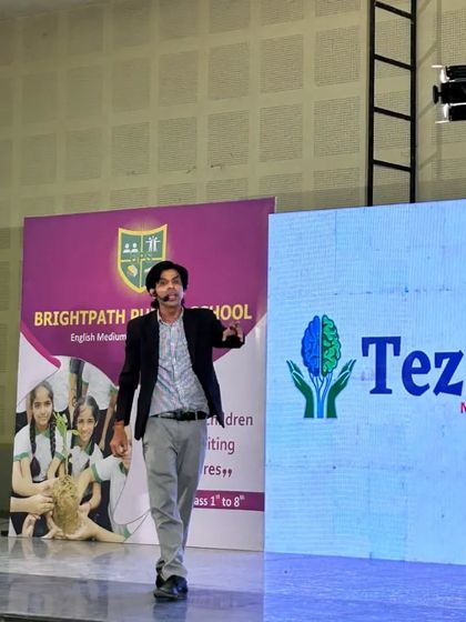 Here I am on stage at our Kishangarh seminar, walking the stage and connecting with the audience. The large screen behind me displays our TezzDimag logo, a symbol of our mission to grow minds through better education.