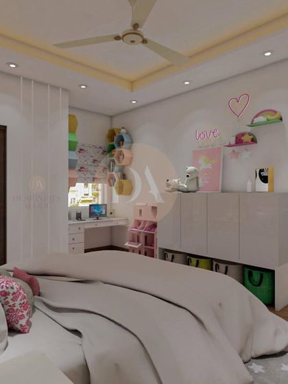 This kids' bedroom in a Gurgaon villa was designed with ample storage to keep the space clean and organized. The design includes a study area and uses a mix of open and closed storage to encourage independence.