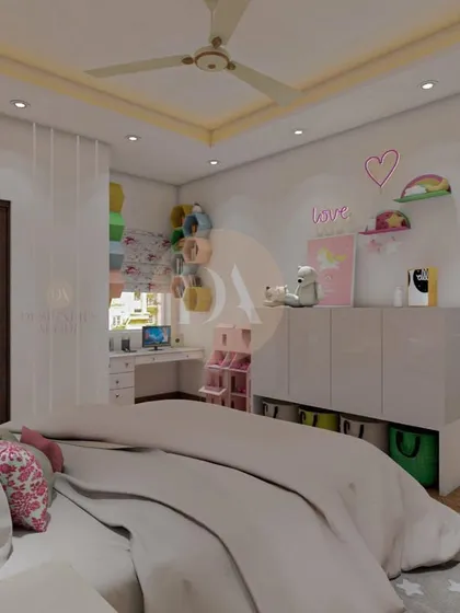 This kids' bedroom in a Gurgaon villa was designed with ample storage to keep the space clean and organized. The design includes a study area and uses a mix of open and closed storage to encourage independence.