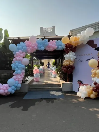 Another view of the grand entrance decor for the horse-themed celebration, showcasing the full balloon arch and personalized welcome sign.