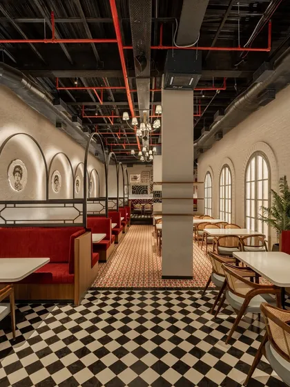 Relaunching an iconic brand like Fountain Sizzlers meant honoring its past while looking to the future. We used a mix of classic checkerboard floors, rich red booths, and custom artwork to create a space that feels both nostalgic and modern, capturing the heart of old Bombay.