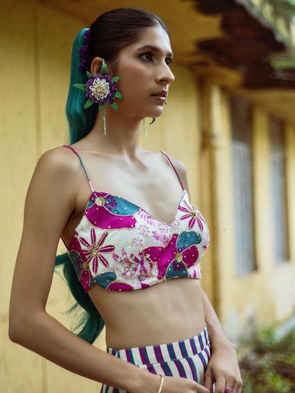 Another angle from the street style shoot, showing off the unique, colorful accessories and makeup.