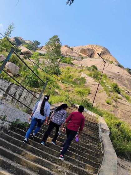 The climb up the stairs on a hill trek, a shared effort that builds bonds.
