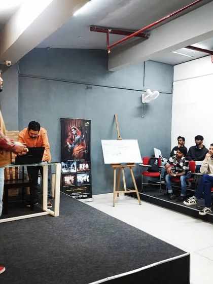 Presenting to a group of photography students. We discussed the art of ceramics and how to capture the texture, form, and process in photos.