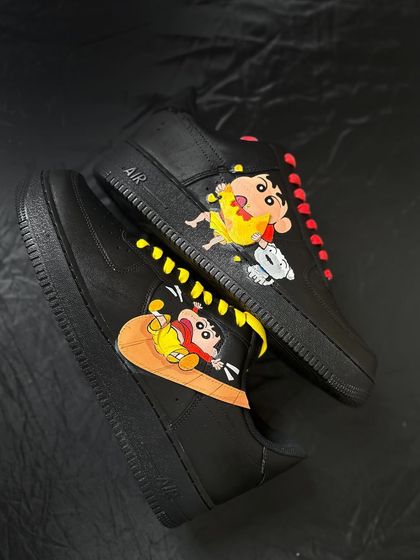 A different angle of the minimal Shin-chan custom on black Air Force 1s.