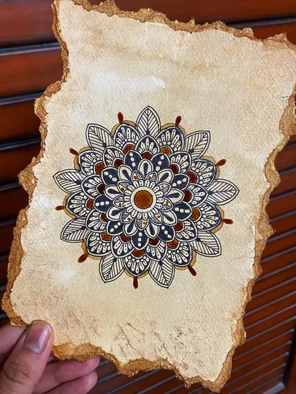 Yes, you can paint with coffee! I used coffee to create the warm, earthy tones in this unique mandala, drawn on rustic, hand-torn watercolor paper for an antique feel.