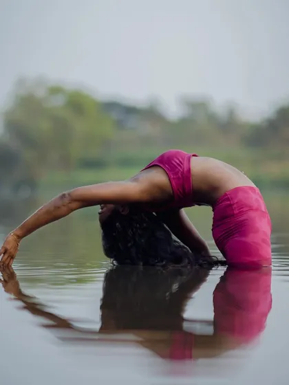 Another variation of a backbend in the water, focusing on the feeling of expansion and surrender.