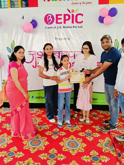 Celebrating the achievements of our students is a key part of our summer camp finale. Here, we are presenting an award to a deserving participant at our 'Jashn-e-bachpan' event.