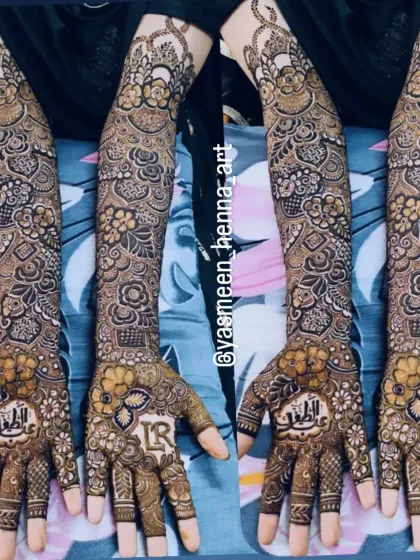 A beautiful bridal design with the initials 'LR' and the name 'Atif' hidden in the intricate patterns.