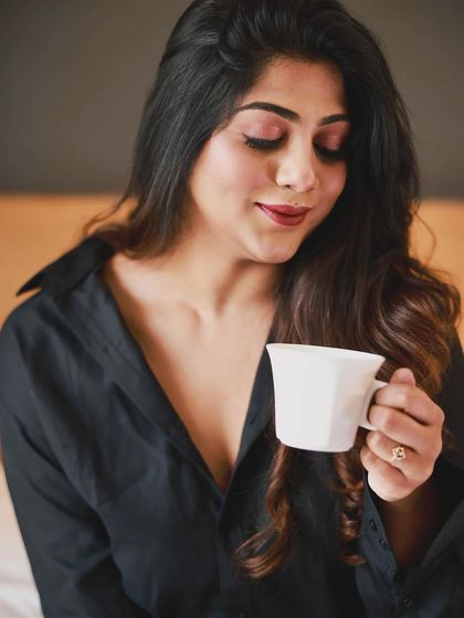 A close-up of the soft glam makeup. The blended eyeshadow and defined lip create a polished and sophisticated look, perfect for professional photos or a chic party.