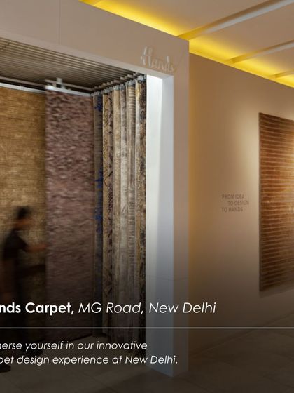 An innovative sliding display at the Hands Carpet showroom in New Delhi. This system allows for a large number of carpets to be shown in a compact space, creating an interactive and engaging experience for the customer.