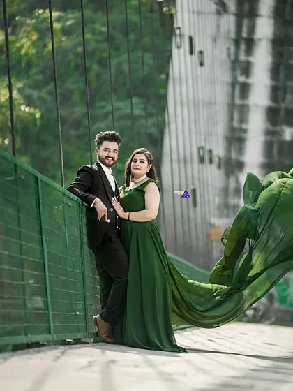 Create unforgettable memories with our pre-wedding shoot outfits. This flowing green gown adds a touch of drama and romance to your photos, and I also offer coordinating suits for men to complete the look.