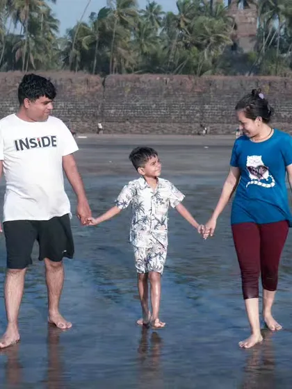 Family lifestyle photography is all about connection. A simple walk on a Mumbai beach, holding hands, creates a timeless memory that feels natural and full of love.