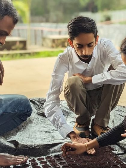 Our trainers guide participants through the process of seed sowing. This collaborative learning environment ensures everyone masters the fundamentals of nursery management.