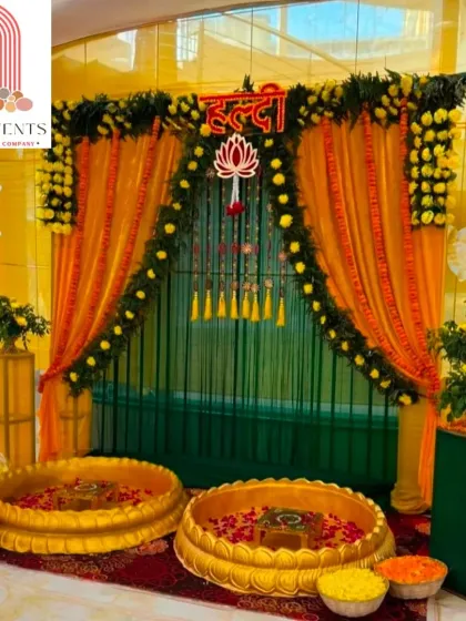 A Haldi ceremony should be full of joy and light. Here, I used a classic combination of marigold flowers and bright yellow and green drapes to create a traditional and cheerful setting. The setup is designed to be perfect for photos while being functional for the ceremony's rituals.