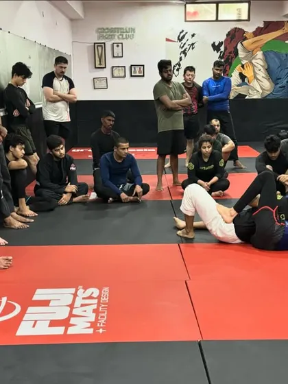 A Sunday Jiu-Jitsu session where a coach demonstrates a technique from the guard. Our classes are interactive, with plenty of time for questions and details.