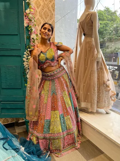 Actress Chandna Gowda looks stunning in our exclusive multi-color panelled lehenga. The intricate handwork on the blouse perfectly complements the vibrant skirt.