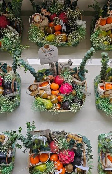 Freshness and elegance are captured in this fruit basket to welcome a little one. I used animal cutouts, fresh florals, and custom jute potlis to create a beautiful and healthy gift for the new family.