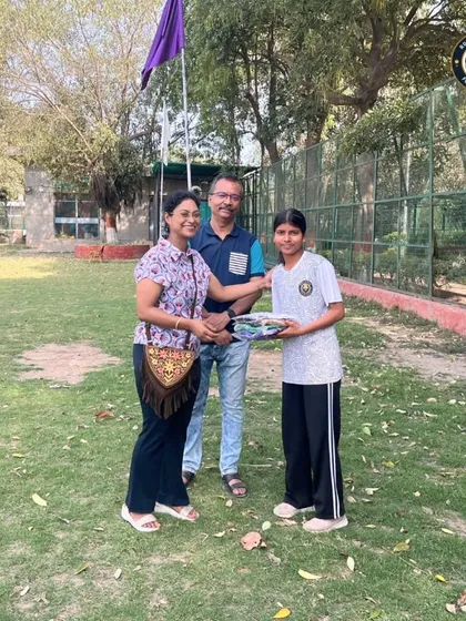 A special moment as our well-wishers, Mudit & Sudheshna Mittal, hand over new kits to one of our players. Their support means the world to us.