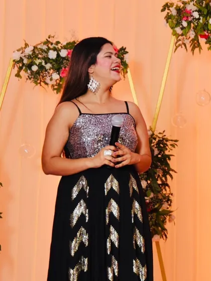 A happy, candid moment during a wedding event. My expressions often mirror the joy and energy of the crowd.