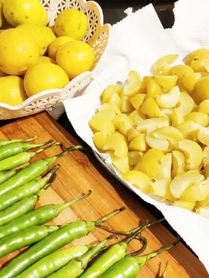 Fresh ingredients for our healthy mixed pickle: amla (Indian gooseberry), lemon, and green chillies. All are known for their health benefits.