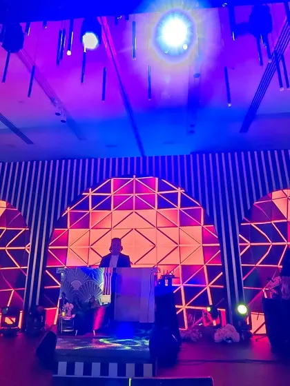 A wide view of the stage for the 60th birthday party in Dubai. The production was top-notch, creating a grand setting for the celebration.