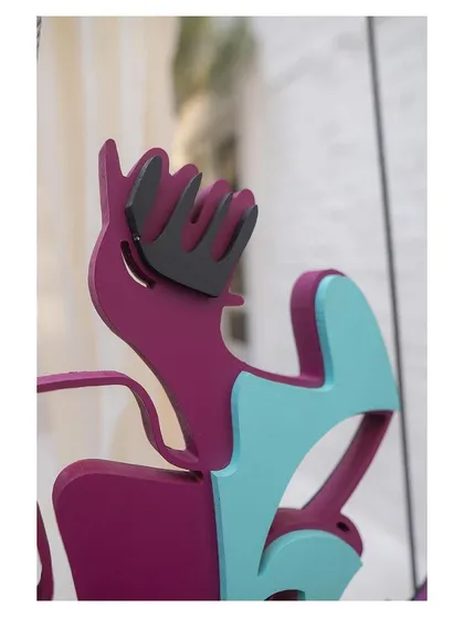 A detail shot of another module, showing the interplay of purple and turquoise forms. These pieces are designed to be tactile and visually engaging from every angle.