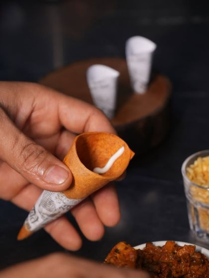 The preparation of our cornetts begins with a swirl of mousse at the bottom, a hidden surprise that adds to the complexity of this seemingly simple bite.