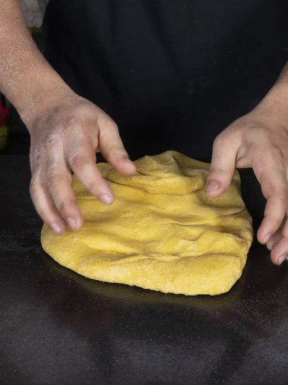 Kneading the pasta dough is a labour of love. The texture has to be just right to create pasta that is tender yet firm to the bite.