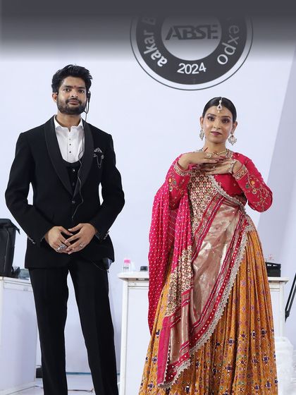 Presenting my bridal nail art on stage with a model at the Aakar Beauty Expo. The complete look came together beautifully.