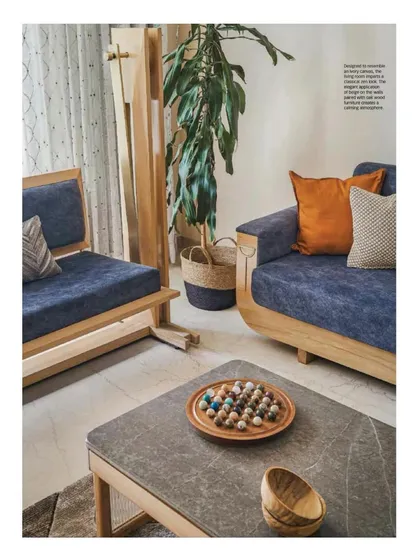 A detail shot from the magazine, focusing on the custom furniture in the living room.