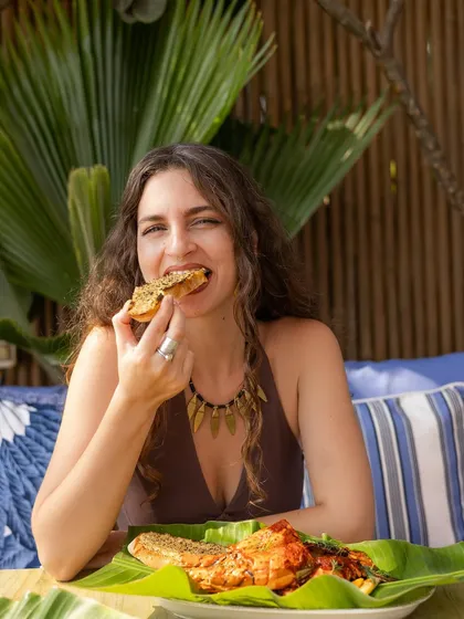 Lifestyle photography is about selling a feeling. This shot captures the pure joy of enjoying good food in a beautiful setting, creating a relatable and aspirational moment for your audience.