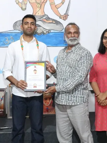 Another successful student from our Aerial Yoga Teacher Training, celebrating his certification with the teaching team.