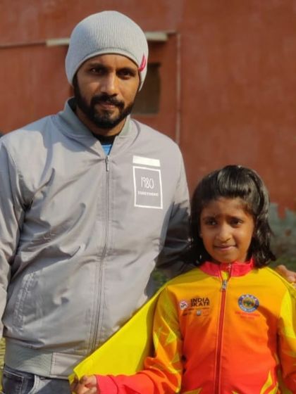 With my daughter during the 59th National Championship. Guiding her on this journey is one of my greatest joys.