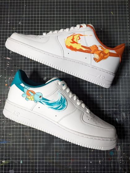 The complete Pokémon Fire and Water edition AF1s. This design features the original starters Squirtle and Charmander in a clean, classic layout.