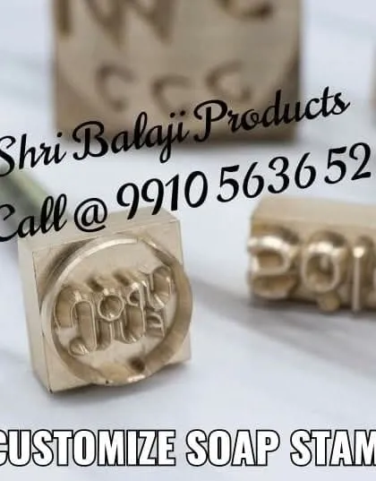 For a classic, handcrafted feel, I create custom metal soap stamps. This close-up shows the fine detail I can achieve with your logo, allowing you to press your brand mark directly onto your soap bars for a premium finish.