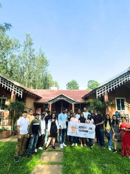 Our group posing in front of a beautiful, traditional-style homestay in Chikmagalur.