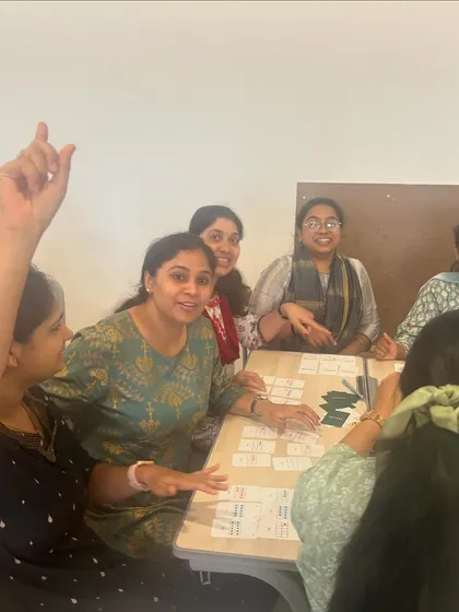 Educators at a 'Math from Scratch' professional development workshop actively participate in a game of Yonjuu. My goal is to empower teachers with hands-on strategies they can immediately bring back to their own classrooms, making math both fun and conceptually clear.
