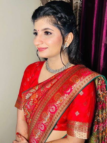 A side profile shot of the Roka bride, highlighting her features and the soft makeup.