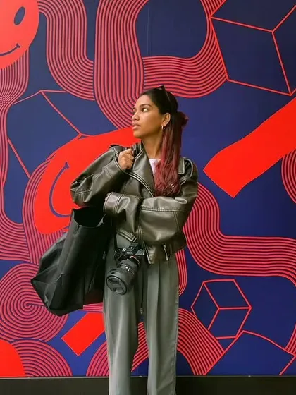 As a photographer and designer, my personal style is a huge part of my creative process. This shot captures my love for bold colors and graphic patterns, which often inspires the creative direction and overlays I bring to my client work.